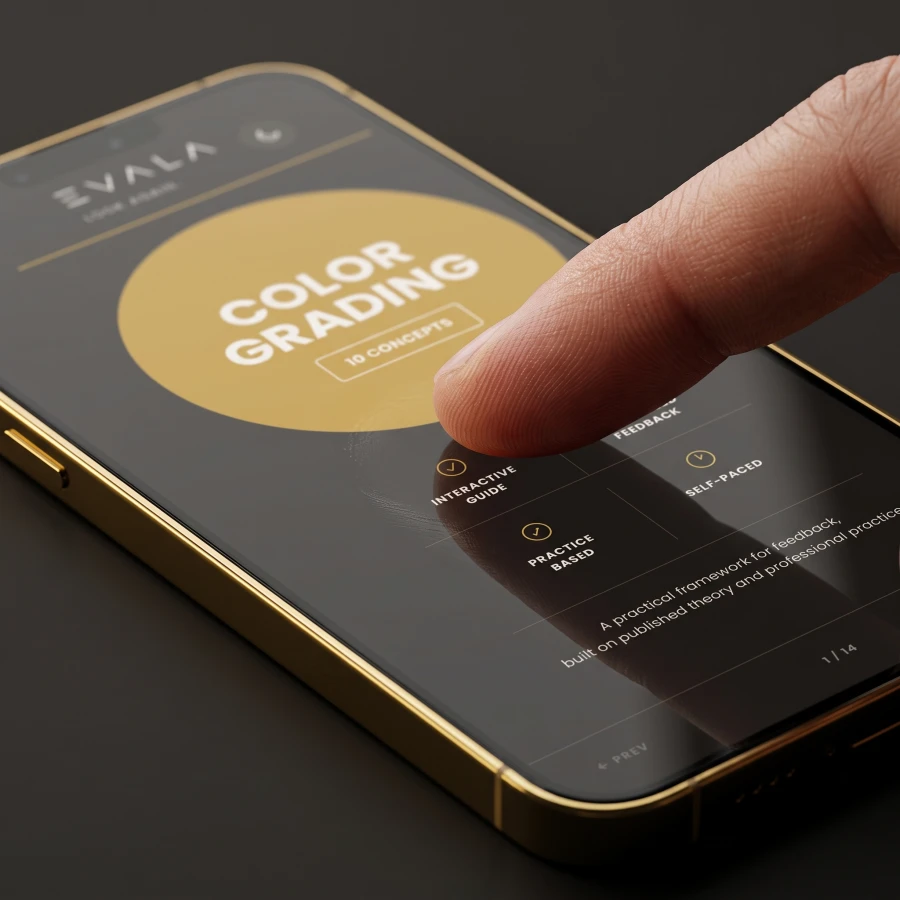 Macro close-up of a fingertip swiping on the EVALA online edition, the real app cover screen visible on the glass